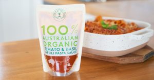 Creamy Tomato Pasta Bake witha pack of the AOFC tomato pasta sauce in front